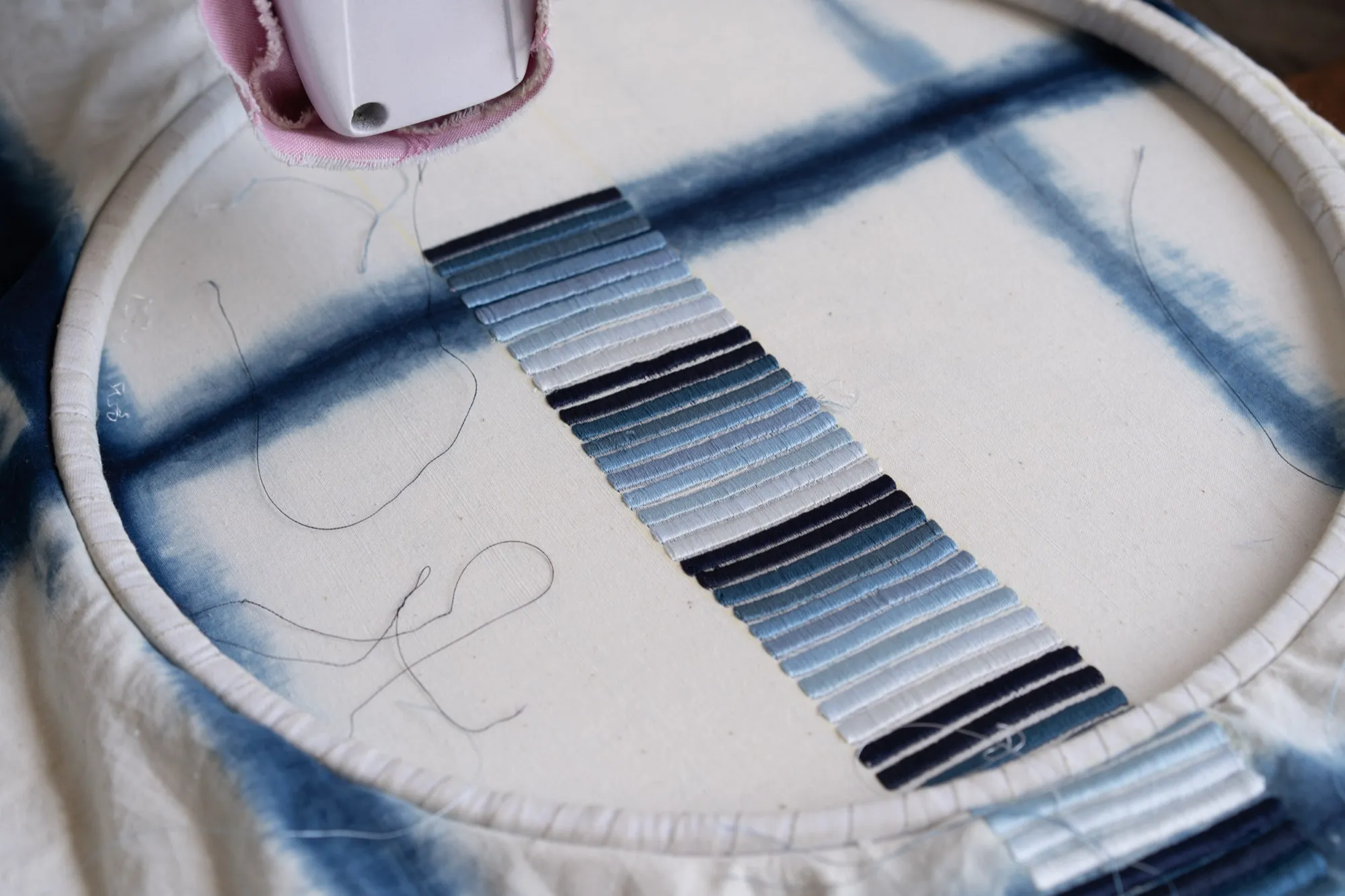 Hand-stitched detail — the chalk-and-thread method